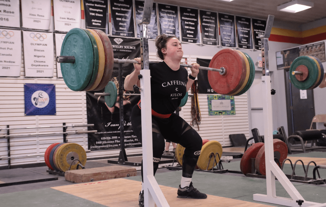 Anna McElderry squatting