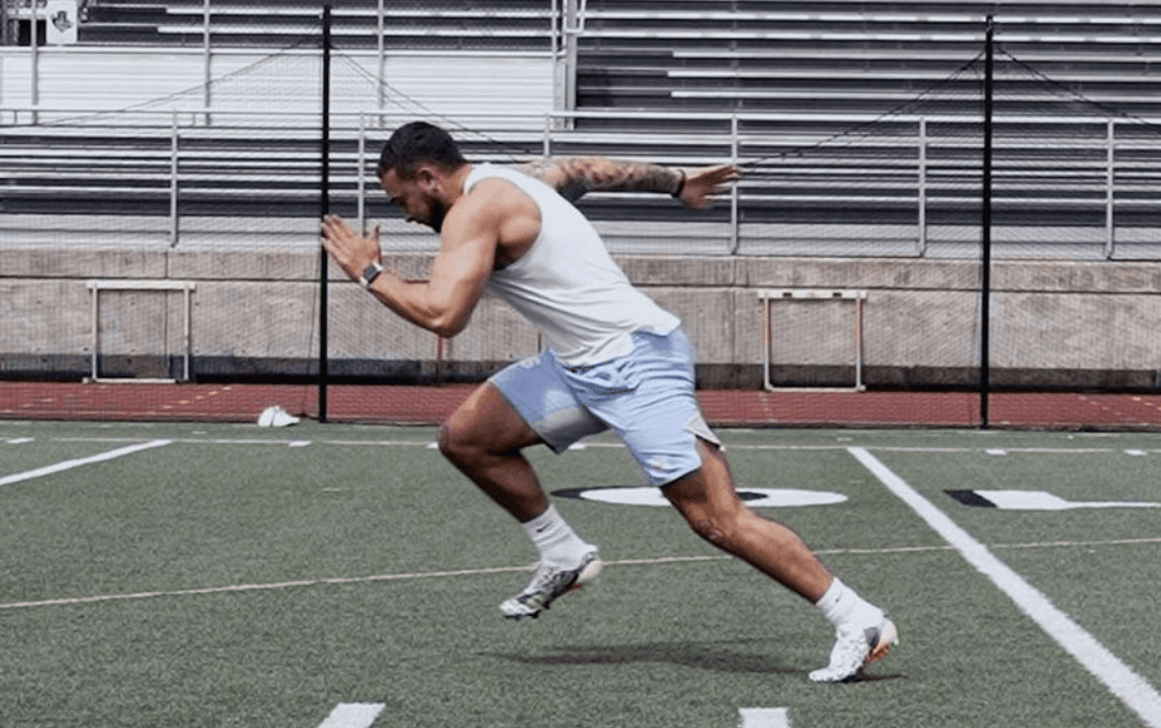 football player sprinting