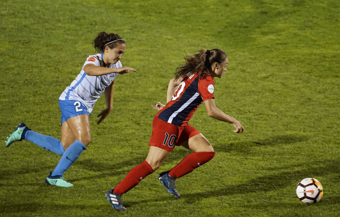 soccer players running