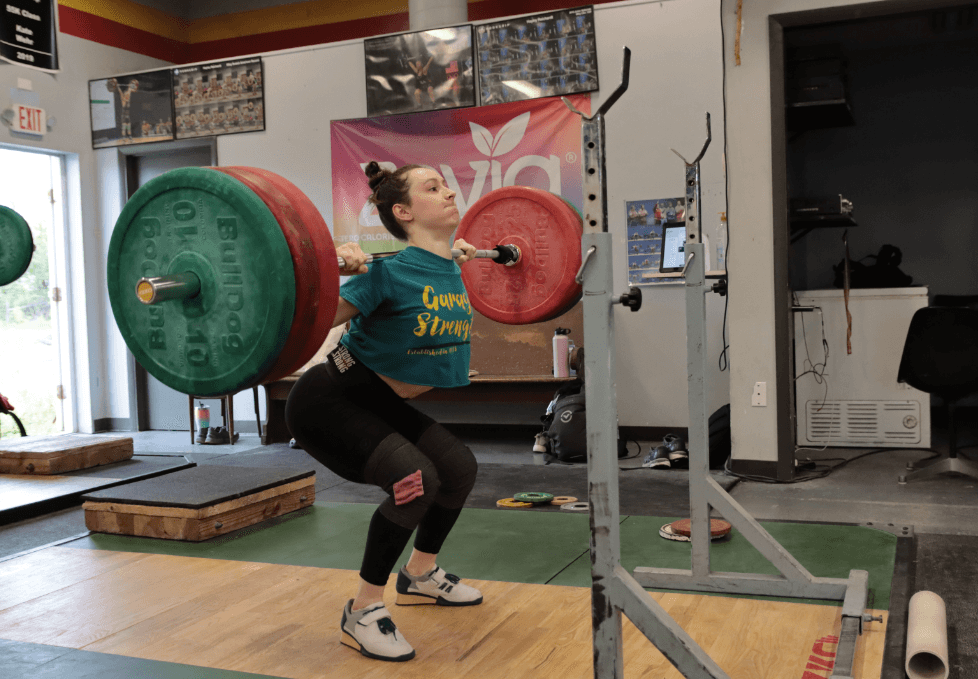 Female weightlifter squatting
